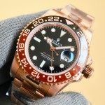 Rolex GMT-Master series, black dial, black and red bezel, 40mm, gold and silver Oyster bracelet.